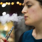 Vaper at an electronic cigarette shop, Covent Garden, London - 12 Nov 2014